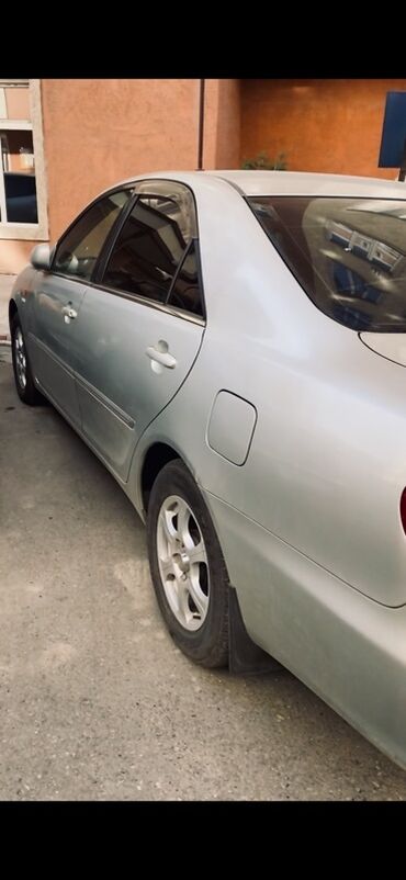 тойота камри сороковка: Серебристый седан Toyota Camry — это практичный и надежный автомобиль
