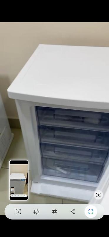 Elektronika: Kraft dondurucu – kompakt, şaquli tip - Rəng: ağ, minimal dizayn - Ön — 2