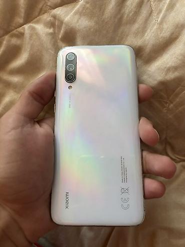 Mobil telefonlar: Xiaomi Mi 9 Lite, 64 GB, rəng - Ağ, 
 Barmaq izi — 2