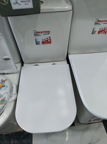 unitaz oturacagi: Beymen firmasının istehsalı olan ağ unitaz. Bu unitaz, hər bir vanna