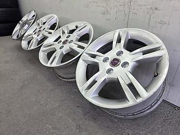 dim staklo: ALUMINIJUMSKE FELNE FIAT GRANDE PUNTO 15 4 X 100 | Fiat Grande Punto — 5