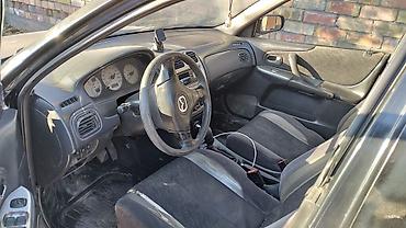 карбиратор газ 53: Mazda 323: 2000 г., Механика, Бензин, Универсал — 1