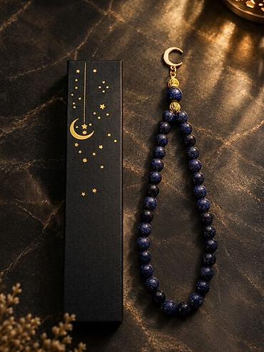 Dərin mavi parıltı, qızılı detallar, təbii daşlar və zərif dizayn. ✨