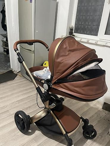 эко бейби: Универсальная детская коляска 3 в 1 JD Baby (коричневая эко‑кожа) — 1