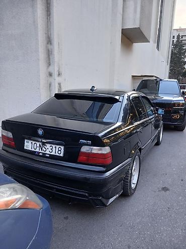 bmw tekeri: BMW 3 Seriya E36 sedan, qara rəng. M-üslub bədən dəsti və ön splitter — 4