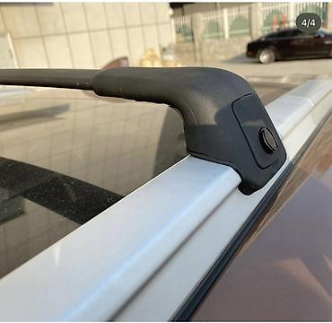Поперечные дуги: Поперечины на штатные рейлинги для кроссовера Toyota (Highlander/RAV4 — 13
