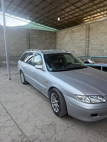 q 7: Mazda 626: 2001 г., 2 л, Механика, Бензин, Универсал — 3