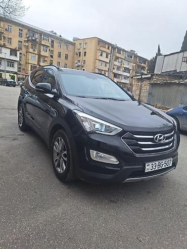 ford focus hatchback: Hyundai Santa Fe: 2 l | 2014 il Krossover — 5