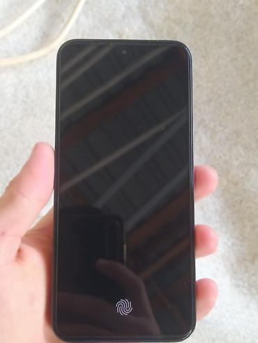 ıphone 14 pro max: Smartfon – tam ekranlı ön panel, ekranaltı barmaq izi oxuyucu ikonu — 1