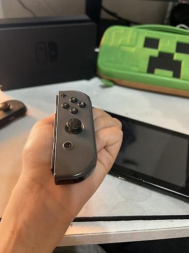 Nintendo Switch: Nintendo Switch (модель с док-станцией) Комплектация: - консоль — 3