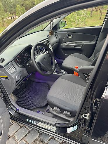 Kia: Kia Rio hatchback Xarici görünüş: - Rəng: qara - 5 qapılı hatchback — 6