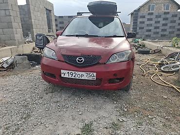 range over: Mazda Demio: 2002 г., 1.3 л, Бензин — 6