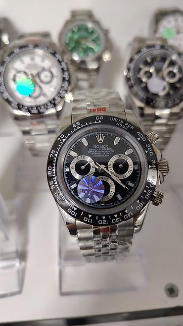 meta eynək: Məhsul: Kvars xronoqraf qol saatları (Rolex Cosmograph Daytona — 1