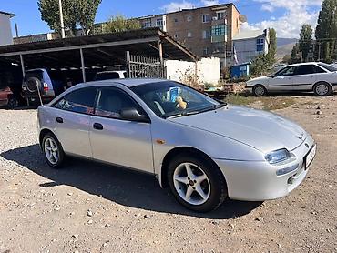 мазда демио диска: Mazda Lantis: 1998 г., Механика, Бензин, Хэтчбэк — 5