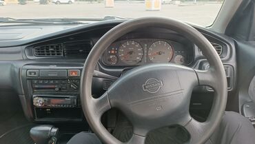 машина 70000: Nissan Bluebird: 1999 г., 1.8 л, Автомат, Бензин, Седан