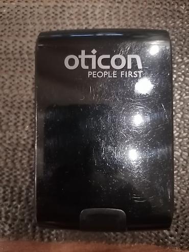 koga sta: Oticon Go Pro – iza-uveta slušni aparat - Brend: Oticon (People — 1