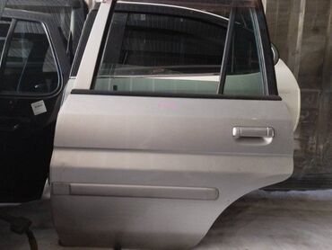 Другие автозапчасти: Дверь Mazda Demio DW3W 1300 2001 задн. лев. (б/у) КУЗОВНЫЕ ДЕТАЛИ -