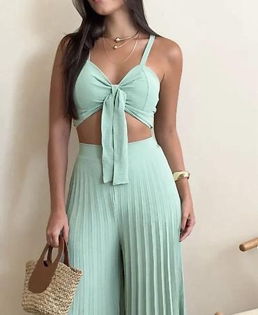 Kompleti: 🔥Ženski komplet – top i široke palazzo pantalone
2500 din — 15