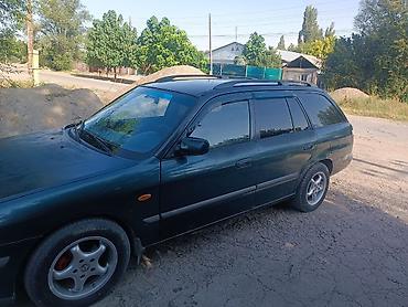Продажа авто: Mazda Familia: 1998 г., Механика, Универсал — 2