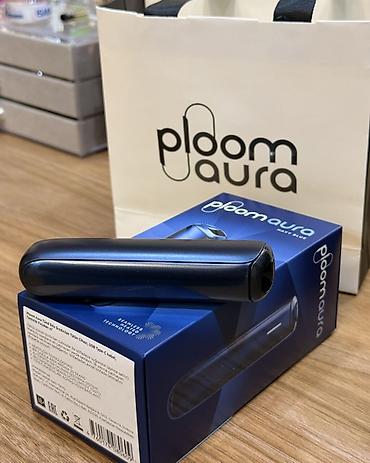 Ploom Aura tütün qızdırıcı cihazı – Navy Blue rəngdə. Şəkillərdə