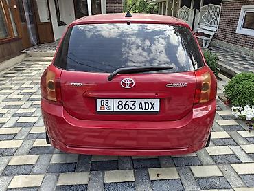 рул: Toyota Corolla: 2006 г., Автомат, Бензин, Хетчбек — 3