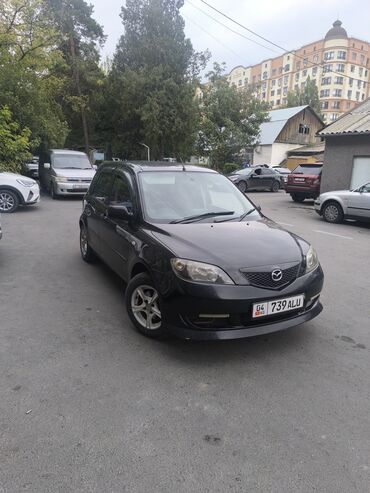 диск майнкрафт: Mazda Demio (Mazda2) — компактный 5‑дверный хэтчбек черного цвета