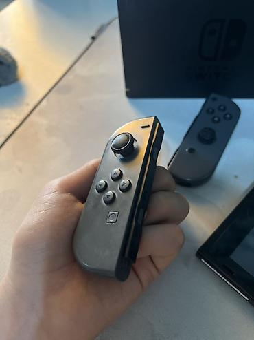 Nintendo Switch: Nintendo Switch (модель с док-станцией) Комплектация: - консоль — 2