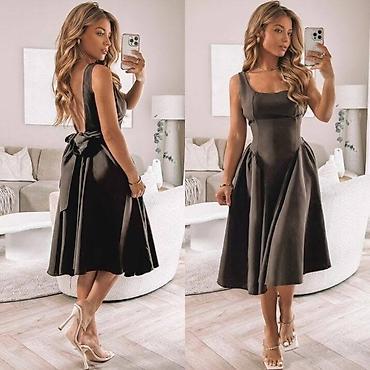 Haljine: 💫Ženska midi haljina sa mašnom na leđima
2700
Uni velicina — 4