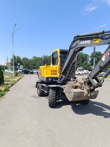 тягачь вольво: Экскаватор, Volvo, 2004 г., Колесный