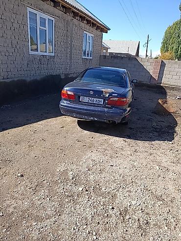 глушитель насадка: Mazda XEDOS 9: 1995 г., 2.5 л, Механика, Бензин, Седан — 3