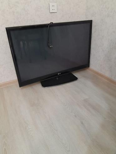 tvin tv elaqe: LG markalı televizor. Geniş ekranlı, qara çərçivəli dizayna malikdir — 1
