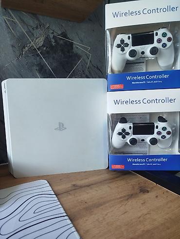 PlayStation 4 Slim (ağ rəng) + 2 ədəd simsiz dualshock tipli idarəetmə