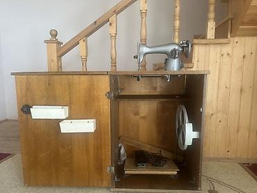 mator elektrik: Tikiş maşını – dolablı, pedallı model.Sonradan motor quraşdırılıb — 2