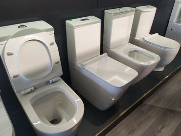 Cмесители для душа: Ağ rəngdə, müasir dizaynlı unitazlar təqdim olunur. Bu unitazlar hamam