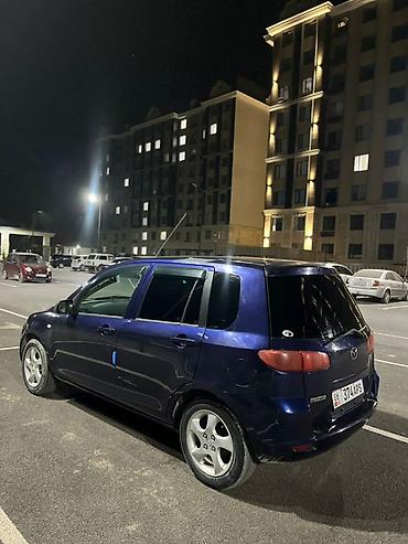 рул: Mazda Demio: 2002 г., 1.3 л, Автомат, Бензин, Хетчбек — 3