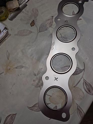 kia starter: KIA orijinal ehtiyat hissələri – silindr başlığı və egzoz kollektor — 2