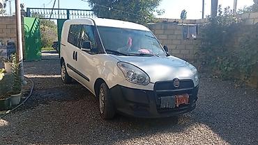 фольксваген тигуан л с: Fiat Doblo Cargo furgonetka - Kuzov: ağ rəng, 2 yan sürüşkən qapı — 1