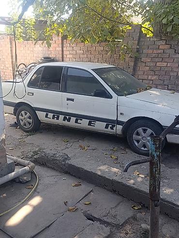 265 40 22: Mitsubishi Lancer: 1989 г., Механика, Седан — 4