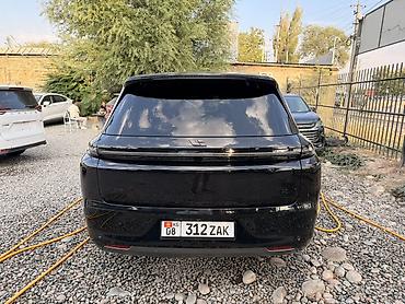 byd e2 2025: Lixiang L8: 2023 г., 1.5 л, Электромобиль, Кроссовер — 2