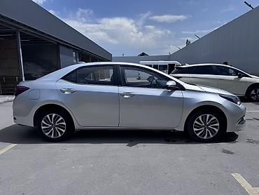 byd e1: Toyota Corolla: 2019 г., 1.8 л, Робот, Гибрид, Седан — 7