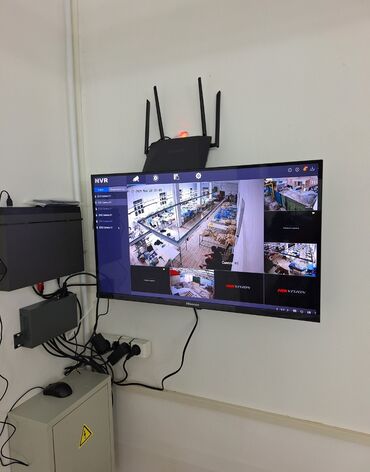 Видеонаблюдение: Белая цилиндрическая IP-камера Hikvision с кронштейном — 12