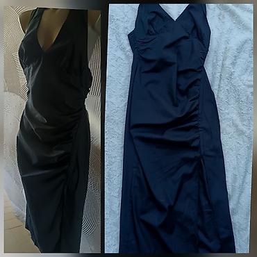 nike react patike: Elegantna crna haljina sa halter izrezom - Duga, uska silueta koja — 2