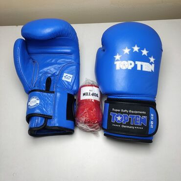 боксерские перчатки: Продаются боксерские перчатки, лапы, бинты по 5м Были использованы