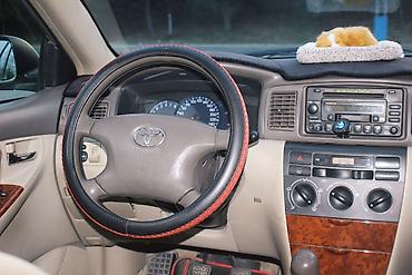 Toyota: Toyota Corolla: 1.8 l | 2005 il Sedan — 16