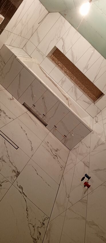 Plitə işləri: Xidmət: Hamam/tualet üçün istilikli döşəmə və kafel-metlax işləri — 30