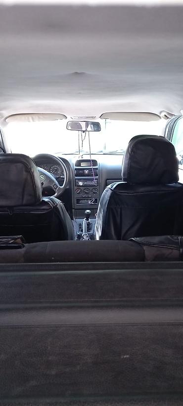 opel astra h android: Opel Astra Caravan (universał) – gümüşü rəngli, 5 qapılı ailə və — 5