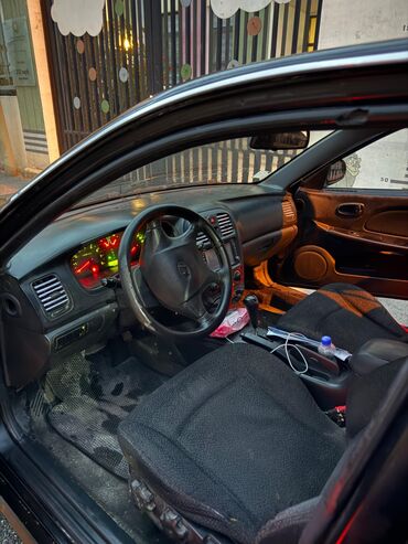 Hyundai: Hyundai Sonata: 2 l | 2004 il Sedan — 4