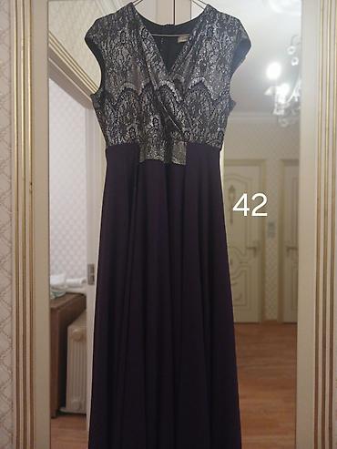 Ziyafət donları: 1) Bəzəkli yaxalı maxi don - Rəng: tünd bənövşəyi - Model: qolsuz — 40