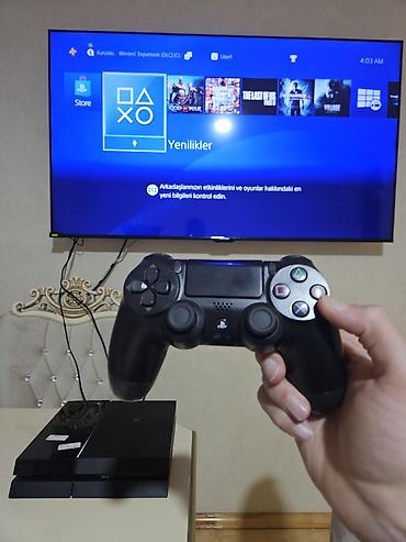 çoxlu oyun: PlayStation 4 (PS4) konsolu – komplektdə DualShock 4 idarəetmə pultu — 1