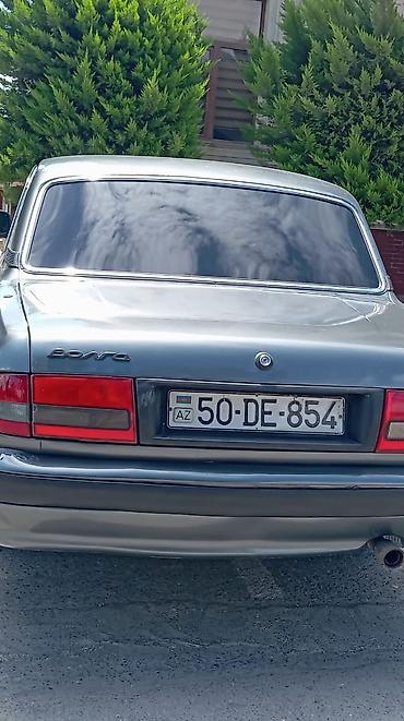volga 2110: GAZ Volga 31105 sedan - Kuzov: 4 qapılı sedan, tünd boz rəng, xrom ön — 9